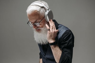 Man listening to headphones, illustrating signal detection