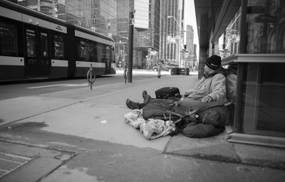 Homeless person representing victim blaming