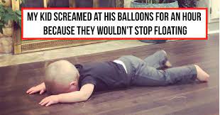 Child having a tantrum on the floor