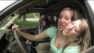 Conjoined twins in a car