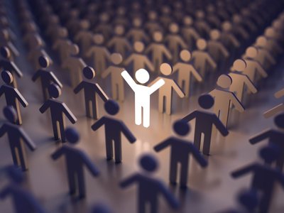 A group of friends celebrating, illustrating the importance of relationships for happiness