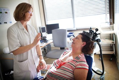 Repetitive transcranial magnetic stimulation (rTMS) in a clinical setting
