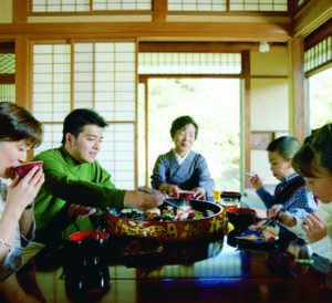 Japanese family eating together, illustrating social and cultural influences on eating