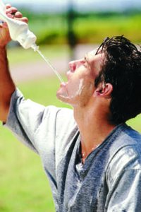 Person drinking water, illustrating primary drive for thirst