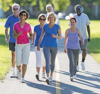 Group of older adults walking for exercise