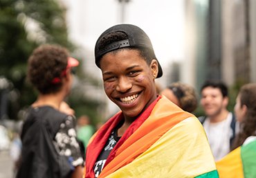 LGBTQ+ youth at a community event, symbolizing support and belonging