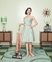 Vintage image of a woman vacuuming, representing traditional gender roles in marriage