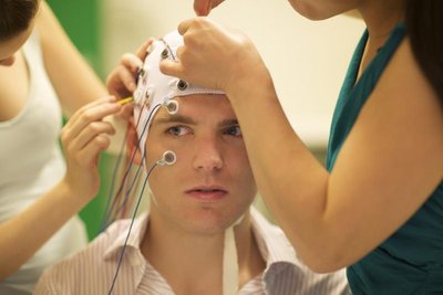 Person undergoing neuroscience research with electrodes