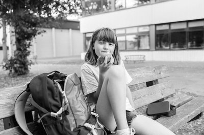 Adolescent girl at school, representing adolescence and social development