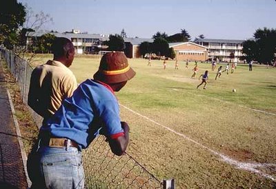 Black children observing segregated sports