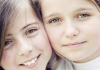 Two children with different eye colors