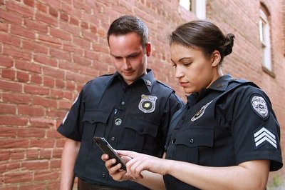 Police officers, illustrating law enforcement and racial profiling
