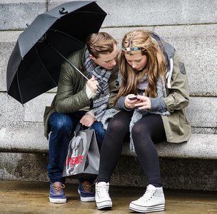 How does technology influence a society's daily occupations?