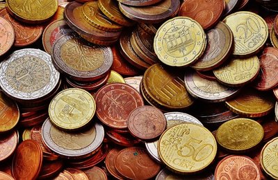 Assorted coins representing coin flips