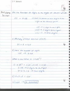 Notebook page with multiplying decimals